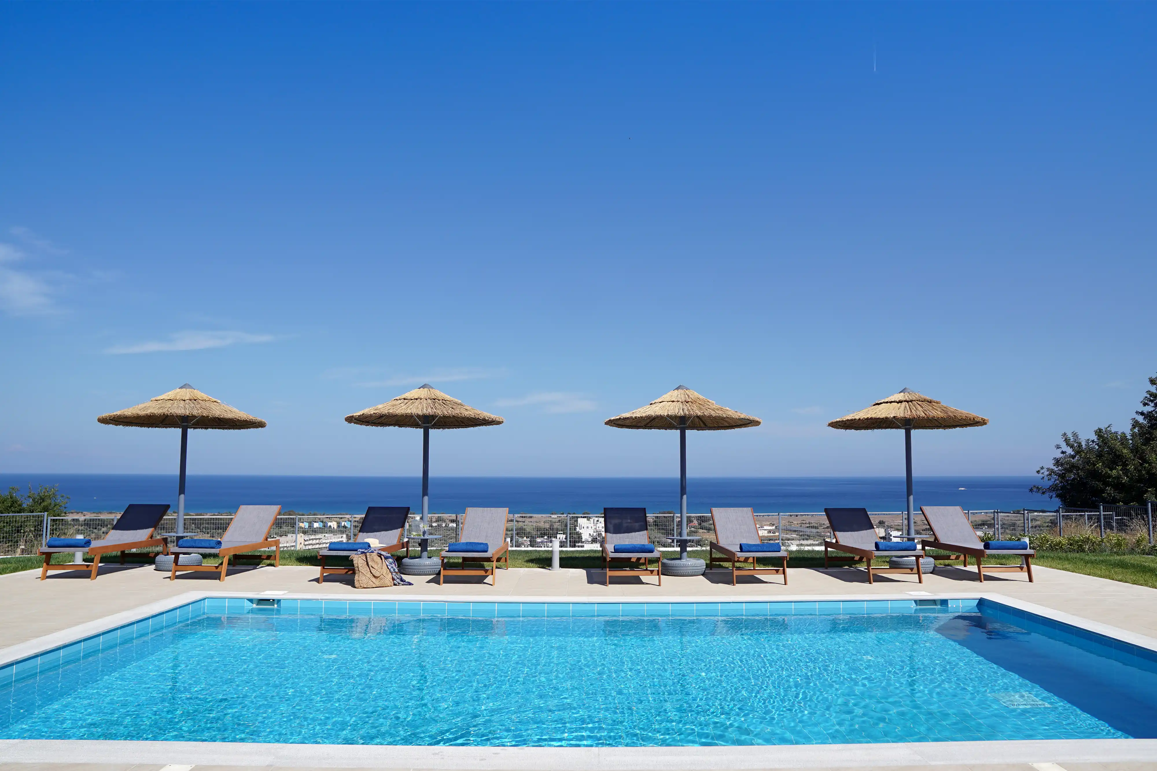 Villa Arco Bianco Rhodes - Outdoor lounge area with comfortable seating and sea views